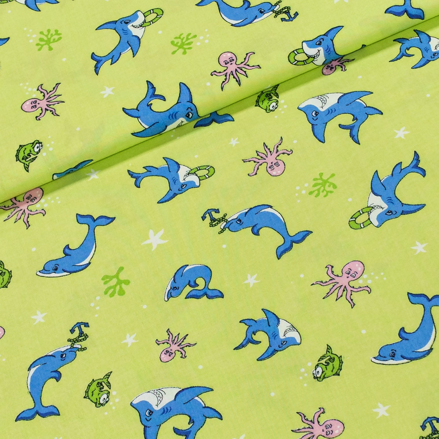 Bavlněné plátno dětské delfíni a chobotnice na zelené š.150cm (látka v metráži)