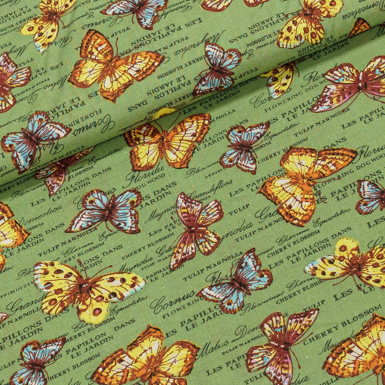Bavlněné plátno motýli a nápisy na zelené, š.140cm (látka v metráži)