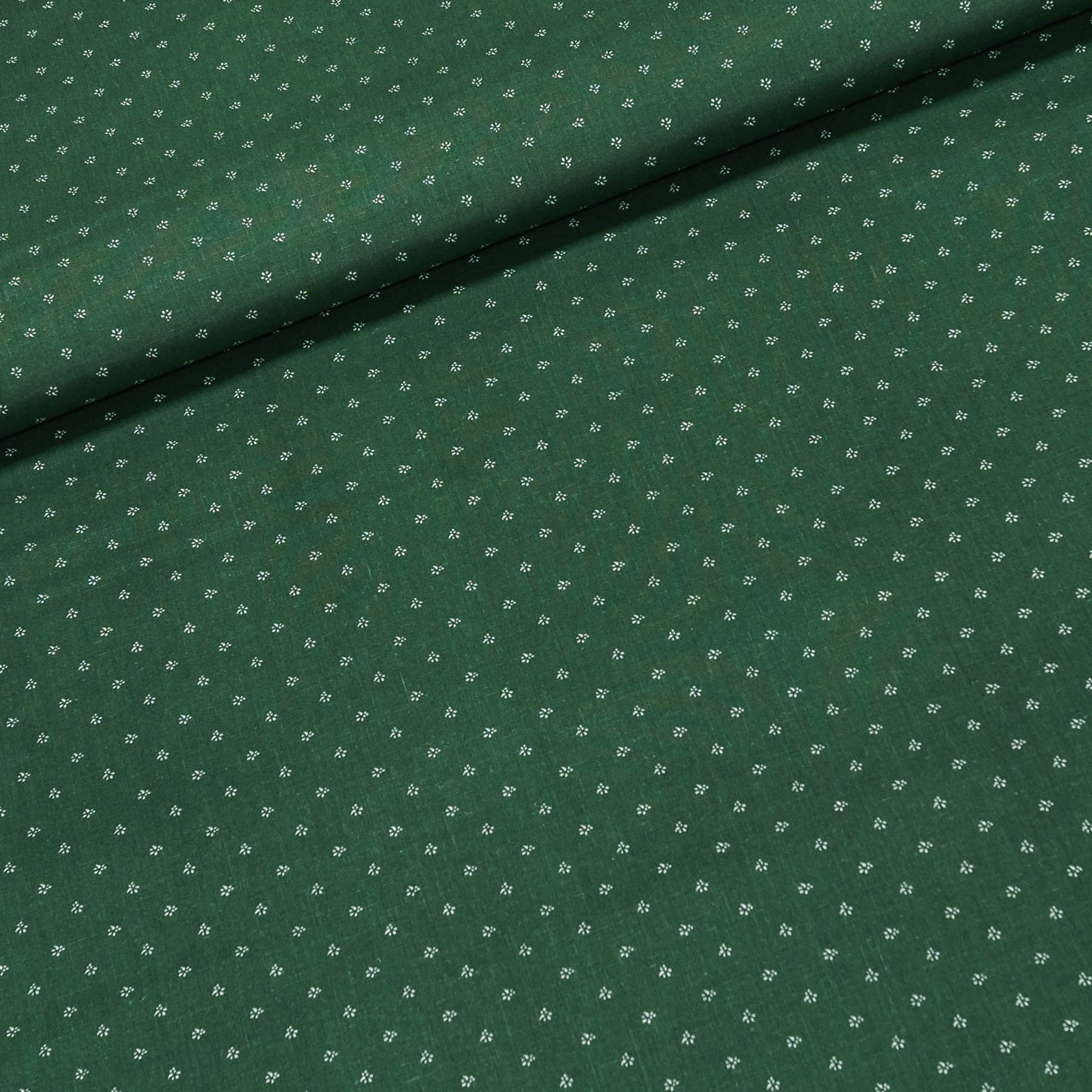 Bavlněné plátno POLO drobné bílé kvítky na zelené, š.140cm (látka v metráži)