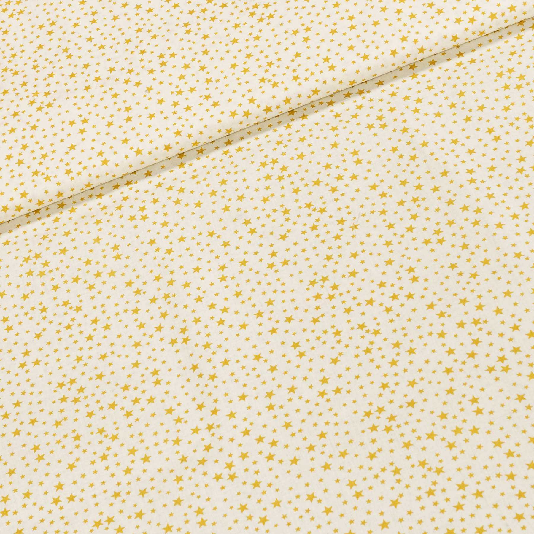 Bavlněné plátno POLO zlaté hvězdičky, š.140cm (látka v metráži)