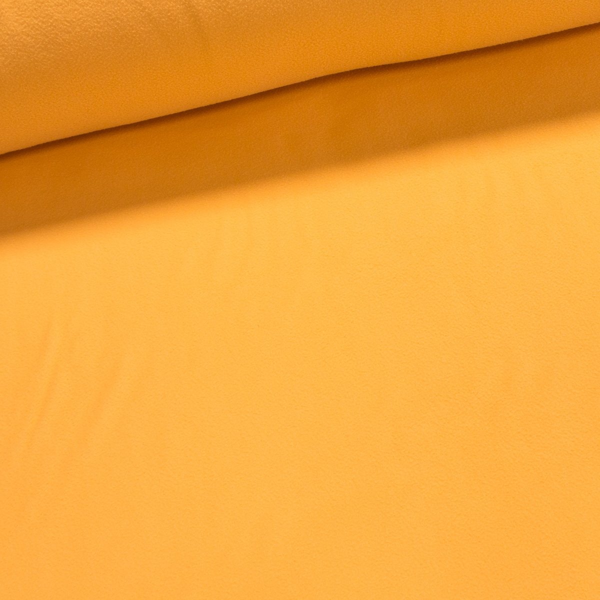 Fleece (flís) jednobarevná uni světle oranžová, š.150cm (látka v metráži)