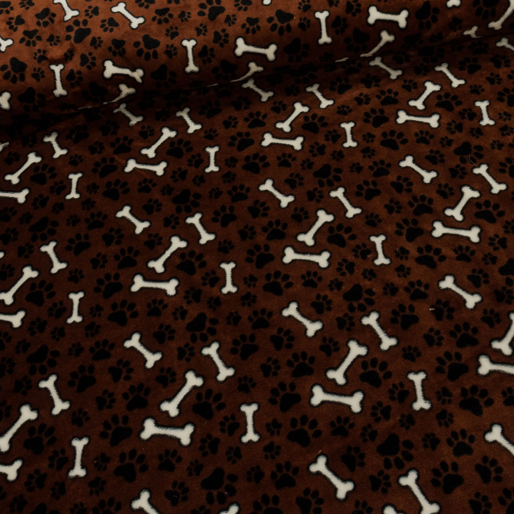 Mikroflanel / flanel fleece 6421 89, kostičky a tlapky na rezavé, š.150cm, (látka v metráži)