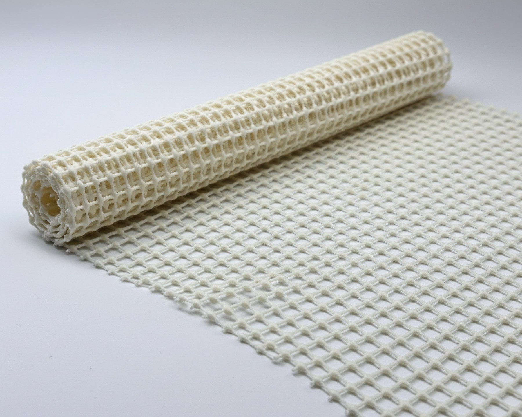 Protiskluzová podložka pod koberec / předložky do koupelny ANTI-SLIP, krémová, šířka 120 cm (látka v metráži)