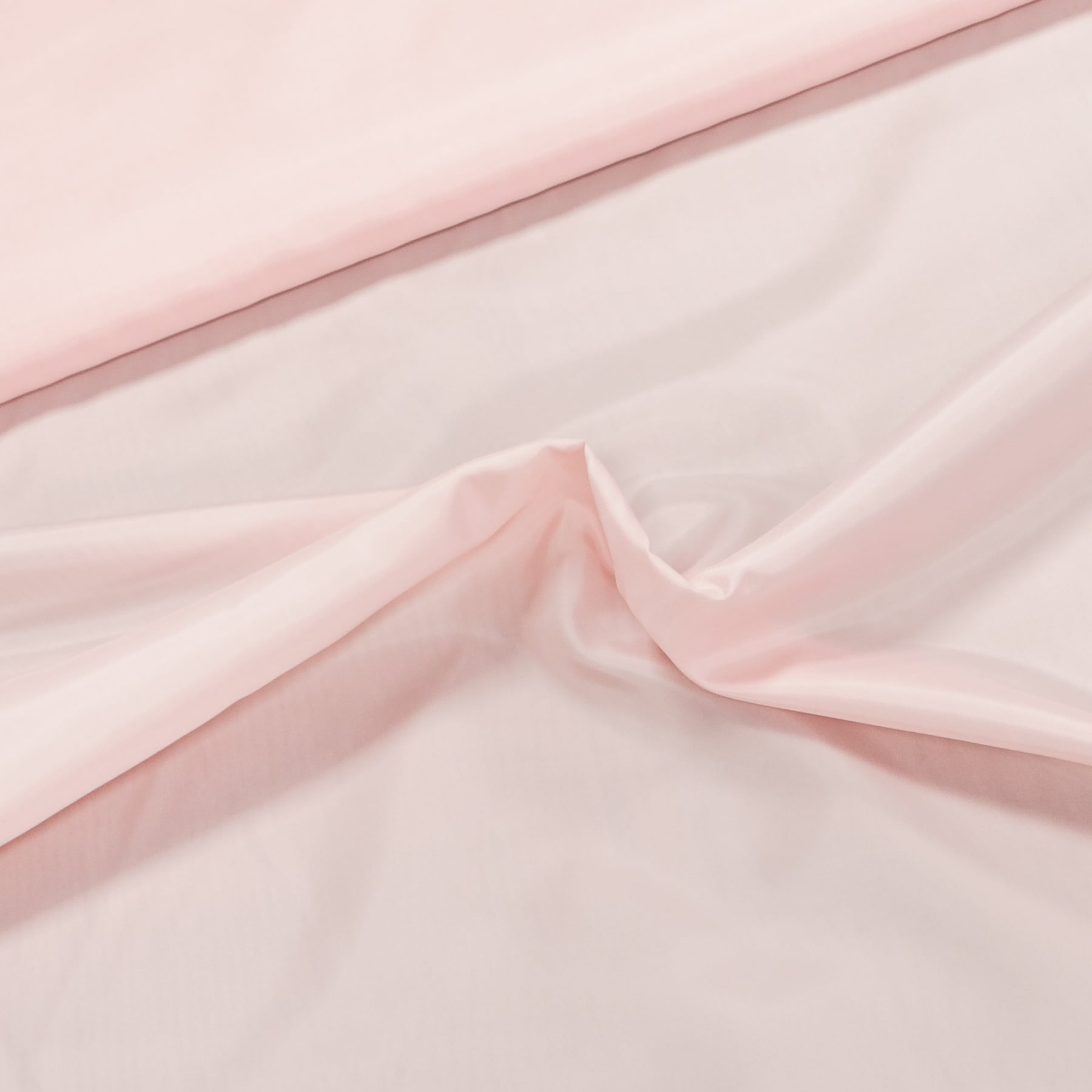 Podšívka polyesterová 5080W-05, jednobarevná světle růžová, š.150cm (látka v metráži)