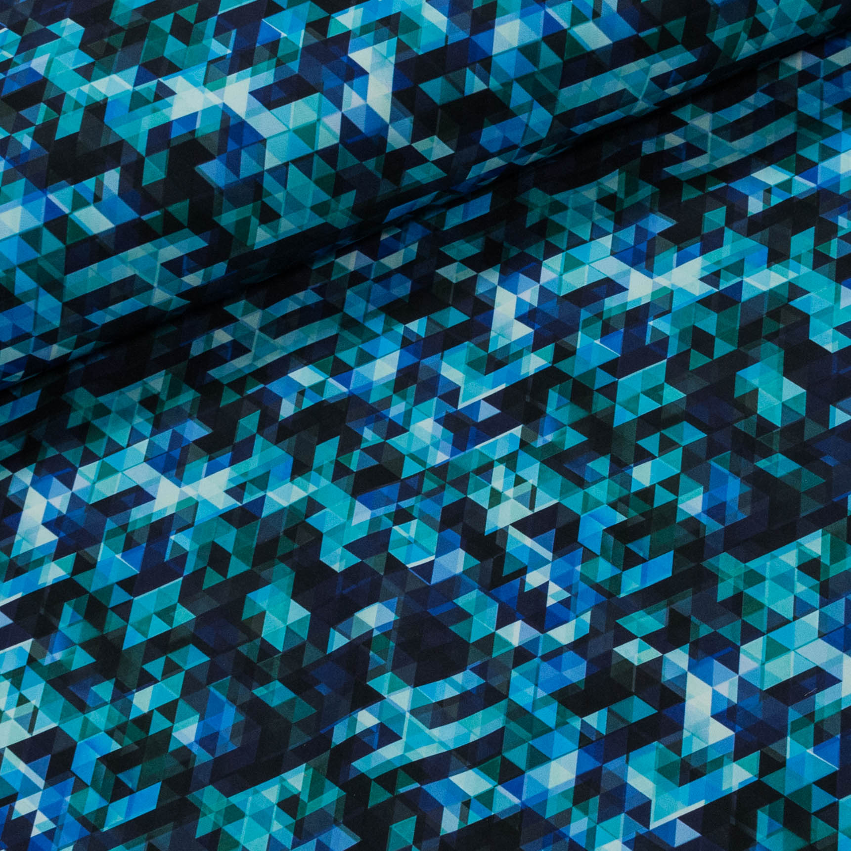 Softshell zimní 22510, tyrkysové trojúhelníky 315g/m2, š.147cm (látka v metráži)