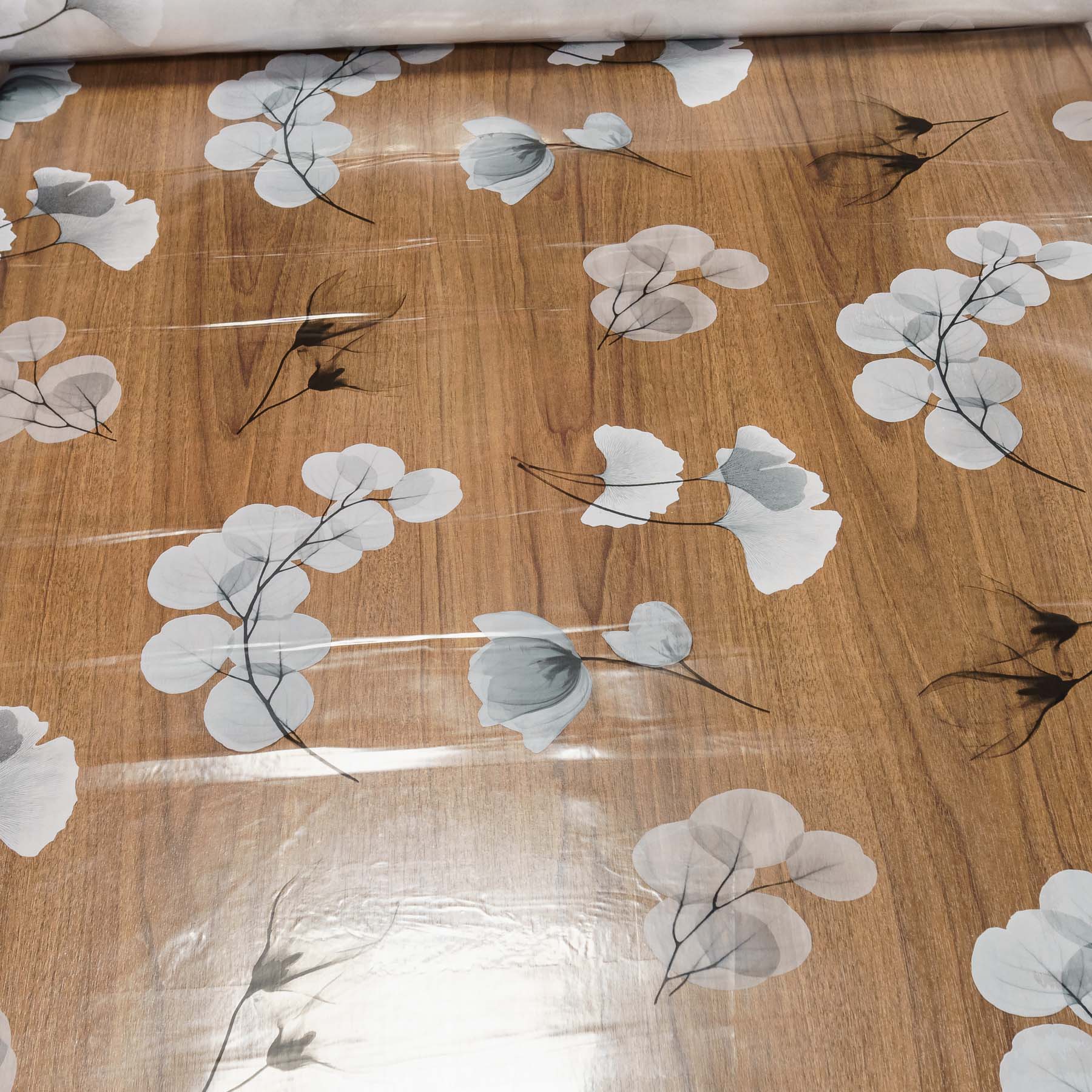 Kristal ubrus PVC průhledný B45/06, šedé větvičky s lístky, š.140cm (metráž)